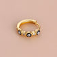 Anillos ajustables ojo protector diseños varios