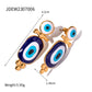 Aretes de ojos protectores diseños varios